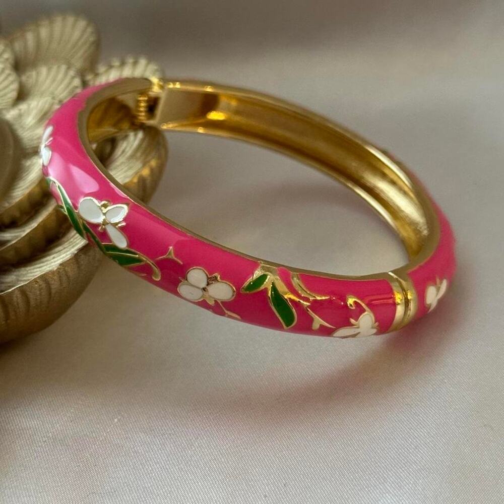Pink bangle with white flowers